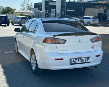 Белый Мицубиси Лансер, объемом двигателя 2 л и пробегом 113 тыс. км за 8500 $, фото 4 на Automoto.ua
