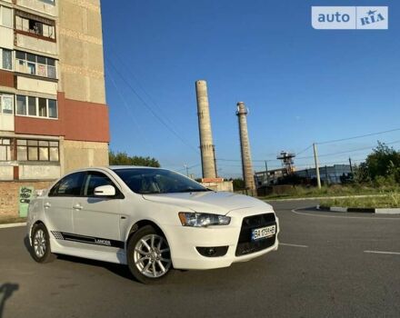 Білий Міцубісі Lancer, об'ємом двигуна 2 л та пробігом 132 тис. км за 8300 $, фото 3 на Automoto.ua