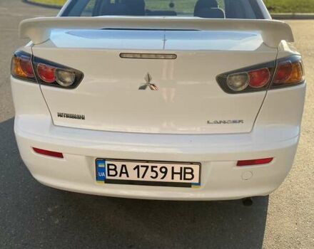 Білий Міцубісі Lancer, об'ємом двигуна 2 л та пробігом 132 тис. км за 8200 $, фото 1 на Automoto.ua
