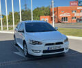 Білий Міцубісі Lancer, об'ємом двигуна 2 л та пробігом 165 тис. км за 7899 $, фото 3 на Automoto.ua