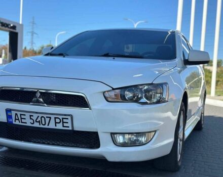 Белый Мицубиси Лансер, объемом двигателя 2 л и пробегом 113 тыс. км за 8500 $, фото 1 на Automoto.ua