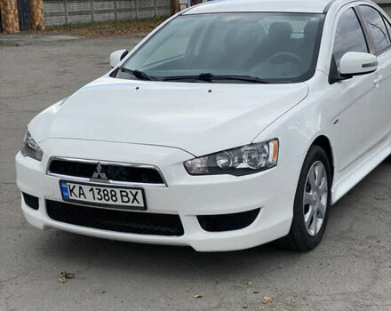Мицубиси Лансер 2015 в Остоге на Automoto.ua Белый Мицубиси Лансер, объемом двигателя 2 л и пробегом 131 тыс. км за 9000 $, фото 17 на Automoto.ua