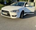 Білий Міцубісі Lancer, об'ємом двигуна 2 л та пробігом 132 тис. км за 8200 $, фото 1 на Automoto.ua