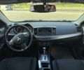 Білий Міцубісі Lancer, об'ємом двигуна 2 л та пробігом 165 тис. км за 8999 $, фото 11 на Automoto.ua