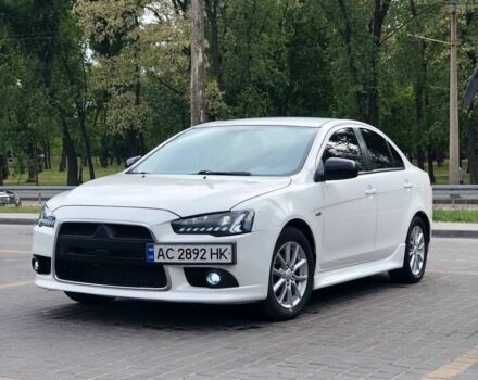 Білий Міцубісі Lancer, об'ємом двигуна 2 л та пробігом 148 тис. км за 8999 $, фото 5 на Automoto.ua