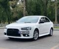 Білий Міцубісі Lancer, об'ємом двигуна 2 л та пробігом 148 тис. км за 8999 $, фото 5 на Automoto.ua