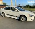 Білий Міцубісі Lancer, об'ємом двигуна 2 л та пробігом 132 тис. км за 8200 $, фото 5 на Automoto.ua