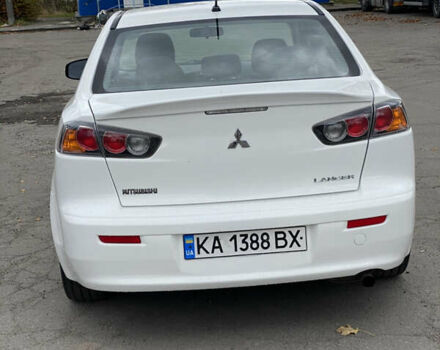 Мицубиси Лансер 2015 в Остоге на Automoto.ua Белый Мицубиси Лансер, объемом двигателя 2 л и пробегом 131 тыс. км за 9000 $, фото 11 на Automoto.ua