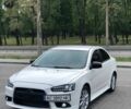 Білий Міцубісі Lancer, об'ємом двигуна 2 л та пробігом 148 тис. км за 8999 $, фото 2 на Automoto.ua