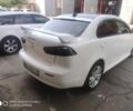 Білий Міцубісі Lancer, об'ємом двигуна 2 л та пробігом 155 тис. км за 8798 $, фото 4 на Automoto.ua