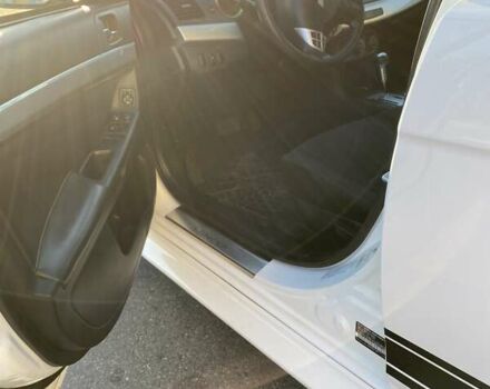 Білий Міцубісі Lancer, об'ємом двигуна 2 л та пробігом 132 тис. км за 8200 $, фото 6 на Automoto.ua