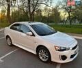Белый Мицубиси Лансер, объемом двигателя 2 л и пробегом 63 тыс. км за 10200 $, фото 1 на Automoto.ua
