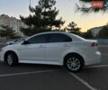 Белый Мицубиси Лансер, объемом двигателя 2 л и пробегом 66 тыс. км за 9499 $, фото 35 на Automoto.ua