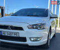 Білий Міцубісі Lancer, об'ємом двигуна 2 л та пробігом 165 тис. км за 7899 $, фото 1 на Automoto.ua