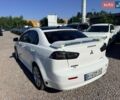 Білий Міцубісі Lancer, об'ємом двигуна 2 л та пробігом 155 тис. км за 9400 $, фото 4 на Automoto.ua
