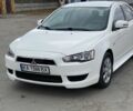 Белый Мицубиси Лансер, объемом двигателя 2 л и пробегом 131 тыс. км за 8727 $, фото 2 на Automoto.ua
