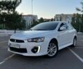 Білий Міцубісі Lancer, об'ємом двигуна 2 л та пробігом 66 тис. км за 9499 $, фото 2 на Automoto.ua