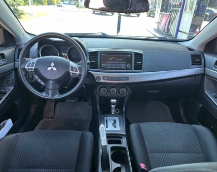 Белый Мицубиси Лансер, объемом двигателя 2 л и пробегом 113 тыс. км за 8500 $, фото 6 на Automoto.ua