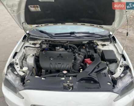 Мицубиси Лансер 2015 в Остоге на Automoto.ua Белый Мицубиси Лансер, объемом двигателя 2 л и пробегом 131 тыс. км за 9000 $, фото 7 на Automoto.ua