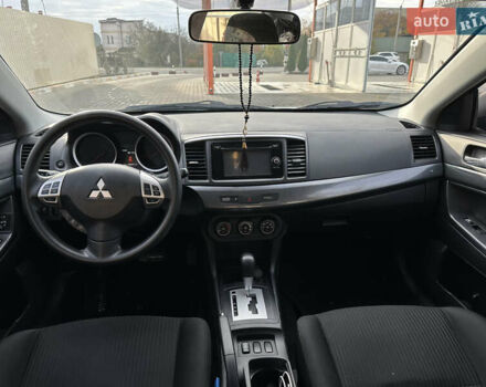 Білий Міцубісі Lancer, об'ємом двигуна 2.36 л та пробігом 175 тис. км за 9000 $, фото 6 на Automoto.ua