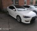 Білий Міцубісі Lancer, об'ємом двигуна 2 л та пробігом 155 тис. км за 8798 $, фото 1 на Automoto.ua