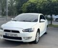 Білий Міцубісі Lancer, об'ємом двигуна 2 л та пробігом 115 тис. км за 8500 $, фото 1 на Automoto.ua