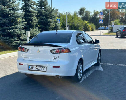 Білий Міцубісі Lancer, об'ємом двигуна 2 л та пробігом 165 тис. км за 7899 $, фото 5 на Automoto.ua