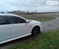 Білий Міцубісі Lancer, об'ємом двигуна 2 л та пробігом 120 тис. км за 11000 $, фото 4 на Automoto.ua