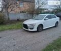 Білий Міцубісі Lancer, об'ємом двигуна 2 л та пробігом 120 тис. км за 11000 $, фото 13 на Automoto.ua