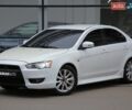 Білий Міцубісі Lancer, об'ємом двигуна 2.36 л та пробігом 156 тис. км за 9500 $, фото 1 на Automoto.ua