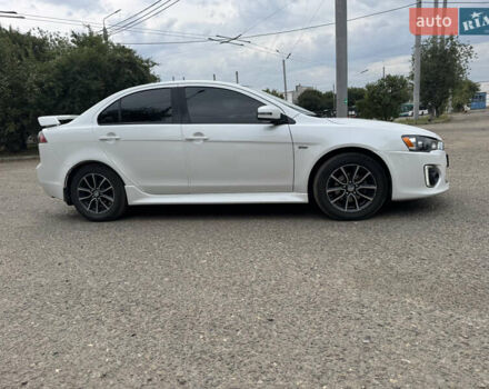 Білий Міцубісі Lancer, об'ємом двигуна 2.36 л та пробігом 85 тис. км за 9200 $, фото 3 на Automoto.ua