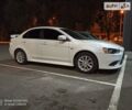 Белый Мицубиси Лансер, объемом двигателя 2 л и пробегом 160 тыс. км за 8999 $, фото 5 на Automoto.ua