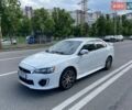 Белый Мицубиси Лансер, объемом двигателя 2.36 л и пробегом 87 тыс. км за 9000 $, фото 1 на Automoto.ua