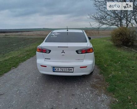 Білий Міцубісі Lancer, об'ємом двигуна 2 л та пробігом 120 тис. км за 11000 $, фото 1 на Automoto.ua