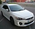 Белый Мицубиси Лансер, объемом двигателя 2 л и пробегом 116 тыс. км за 10500 $, фото 3 на Automoto.ua