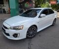 Білий Міцубісі Lancer, об'ємом двигуна 2 л та пробігом 113 тис. км за 9600 $, фото 1 на Automoto.ua