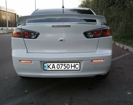 Белый Мицубиси Лансер, объемом двигателя 2 л и пробегом 116 тыс. км за 10500 $, фото 4 на Automoto.ua