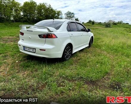 Белый Мицубиси Лансер, объемом двигателя 2 л и пробегом 100 тыс. км за 8750 $, фото 4 на Automoto.ua