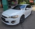Белый Мицубиси Лансер, объемом двигателя 2 л и пробегом 113 тыс. км за 8999 $, фото 1 на Automoto.ua