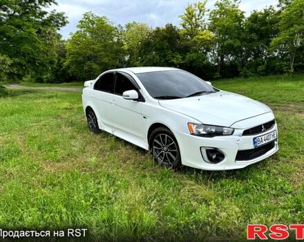 Белый Мицубиси Лансер, объемом двигателя 2 л и пробегом 100 тыс. км за 8750 $, фото 1 на Automoto.ua