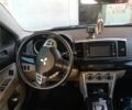 Білий Міцубісі Lancer, об'ємом двигуна 2 л та пробігом 115 тис. км за 10087 $, фото 5 на Automoto.ua