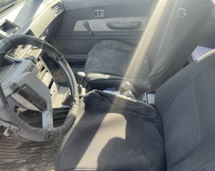 Белый Мицубиси Лансер, объемом двигателя 1.9 л и пробегом 438 тыс. км за 462 $, фото 6 на Automoto.ua