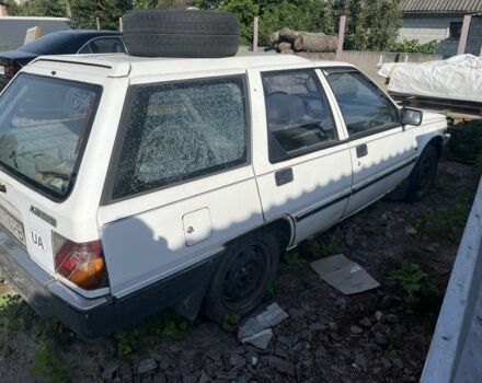 Білий Міцубісі Lancer, об'ємом двигуна 1.9 л та пробігом 438 тис. км за 463 $, фото 1 на Automoto.ua