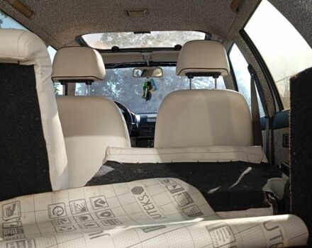 Білий Міцубісі Lancer, об'ємом двигуна 1.5 л та пробігом 280 тис. км за 601 $, фото 13 на Automoto.ua