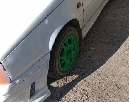 Білий Міцубісі Lancer, об'ємом двигуна 1.5 л та пробігом 280 тис. км за 601 $, фото 7 на Automoto.ua