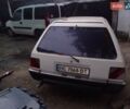 Белый Мицубиси Лансер, объемом двигателя 1.47 л и пробегом 300 тыс. км за 1100 $, фото 1 на Automoto.ua