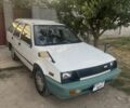 Білий Міцубісі Lancer, об'ємом двигуна 1.5 л та пробігом 275 тис. км за 1951 $, фото 1 на Automoto.ua