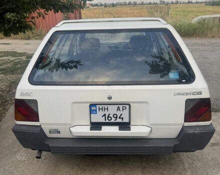 Білий Міцубісі Lancer, об'ємом двигуна 1.5 л та пробігом 275 тис. км за 1951 $, фото 4 на Automoto.ua