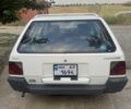 Білий Міцубісі Lancer, об'ємом двигуна 1.5 л та пробігом 275 тис. км за 1951 $, фото 4 на Automoto.ua