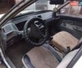 Белый Мицубиси Лансер, объемом двигателя 1.47 л и пробегом 300 тыс. км за 1100 $, фото 4 на Automoto.ua